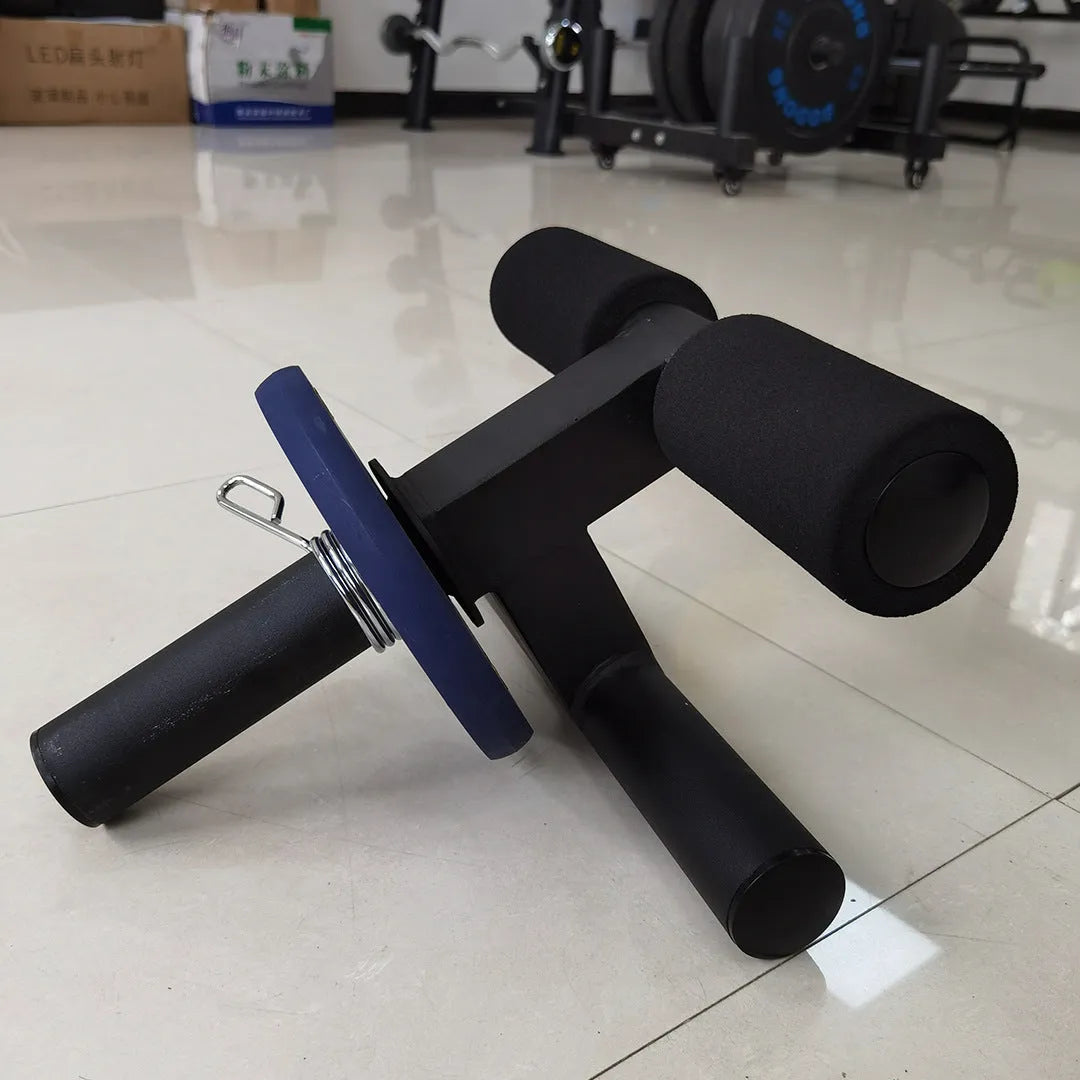 Black steel plate inner calf muscle trainer on a gym floor, dimensions 36x21.5x38.5cm