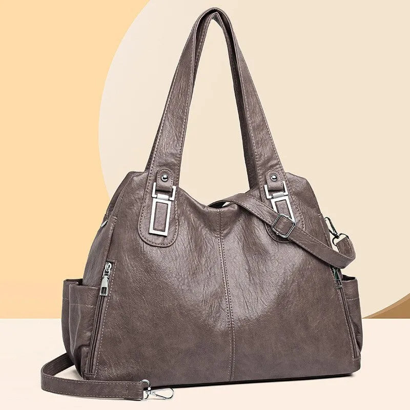 Women's soft PU tote bag in square vertical shape with single shoulder strap and internal zippered compartment
