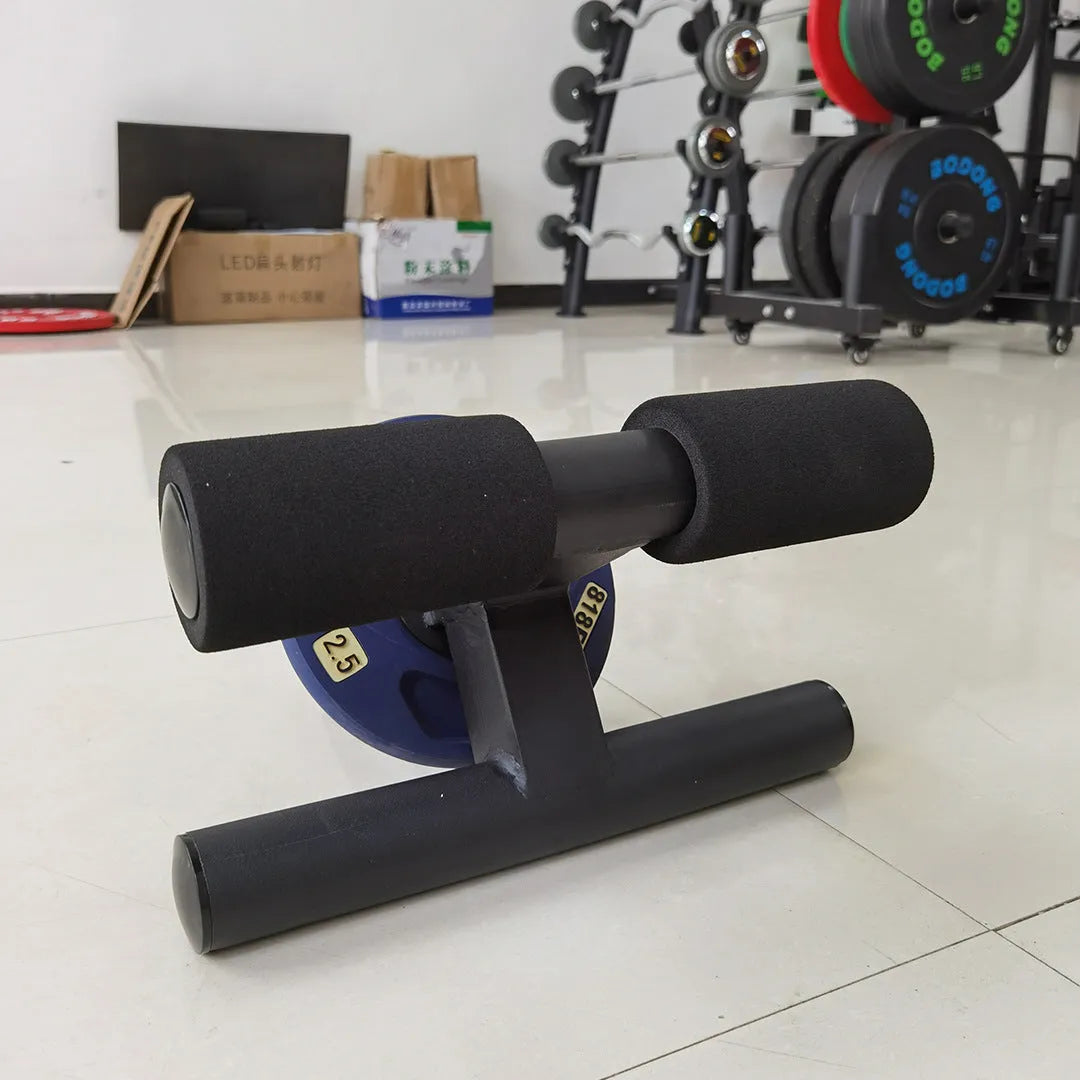 Black steel plate inner calf muscle trainer on a gym floor, dimensions 36x21.5x38.5cm