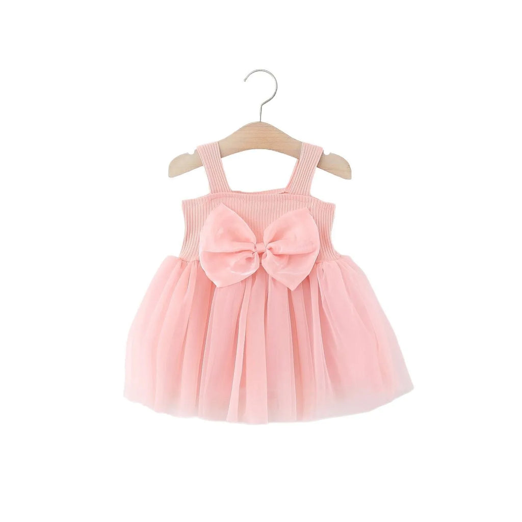 Girls sleeveless solid colour summer dress in polyester fibre, sling style, available in pink and red sizes 80-120