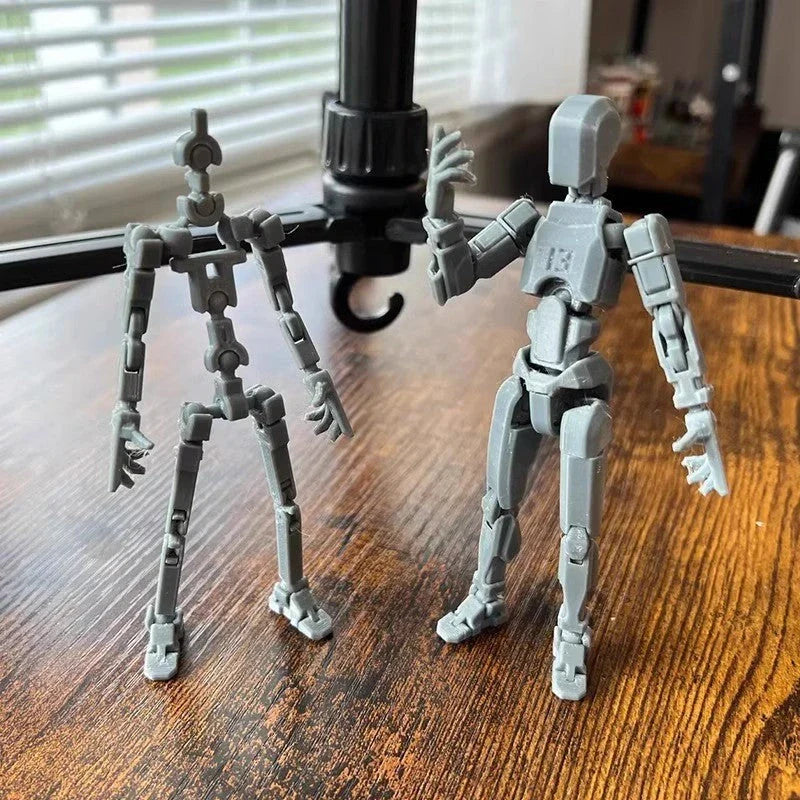 Customizable 3D printed robot mannequin with posable joints for creative expression, illustration, desk decor, and unique gifting.