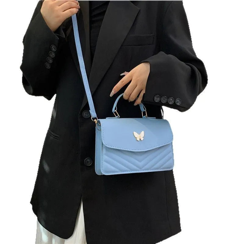 Women's PU horizontal square handbag with bow detail in dark blue colour option