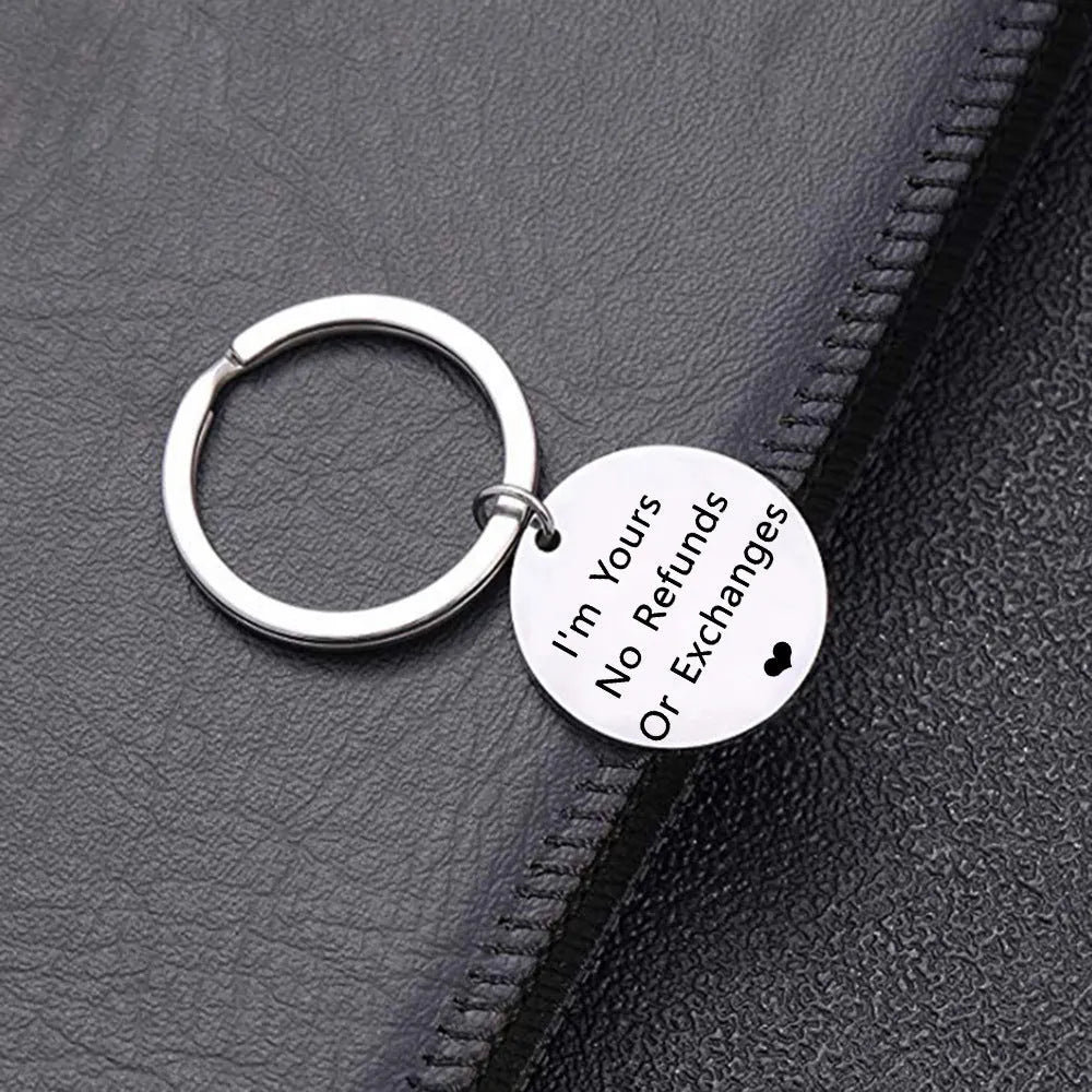 Titanium steel keychain 30mm width unisex design steel colour finish on white background