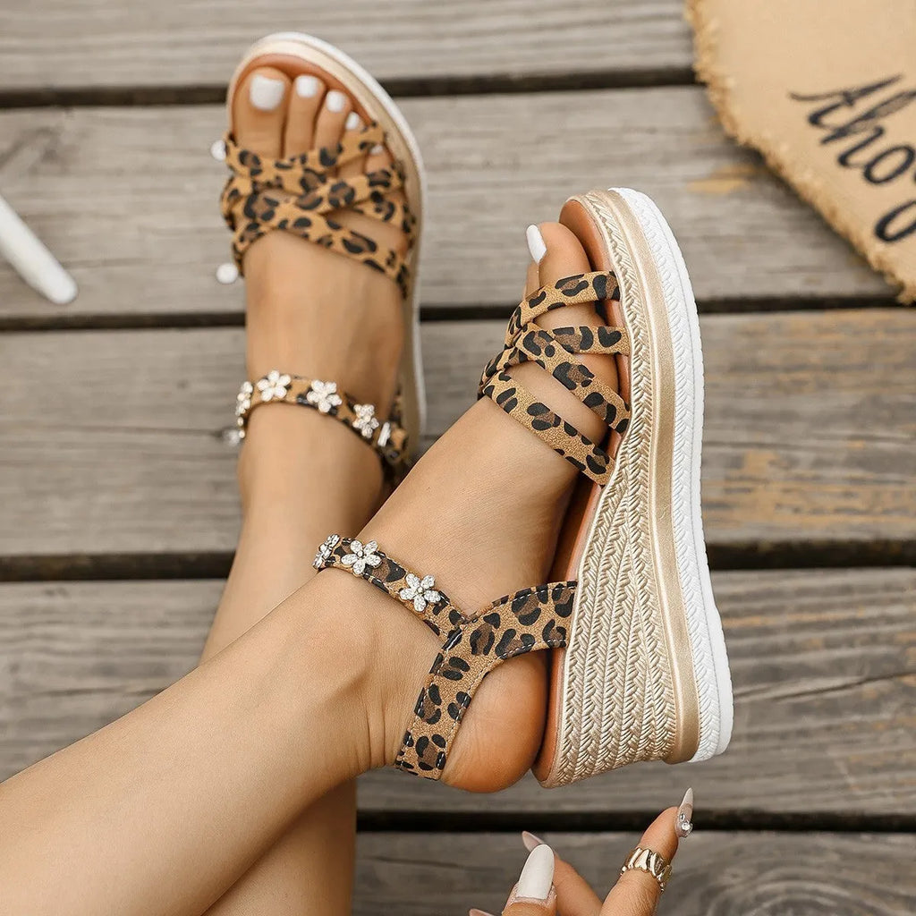 Light brown suede platform sandals with adjustable ankle buckle and open toe design