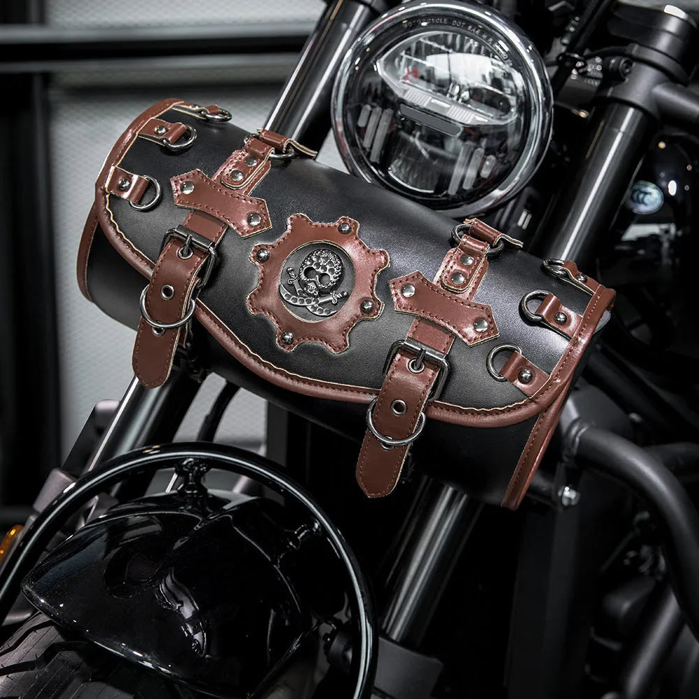 Black punk style retro motorcycle pannier saddle bag made from PU leather, mounted on a bike frame.