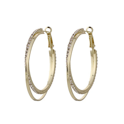 Geometric alloy earrings and bracelet set in gold and silver, modern design jewellery