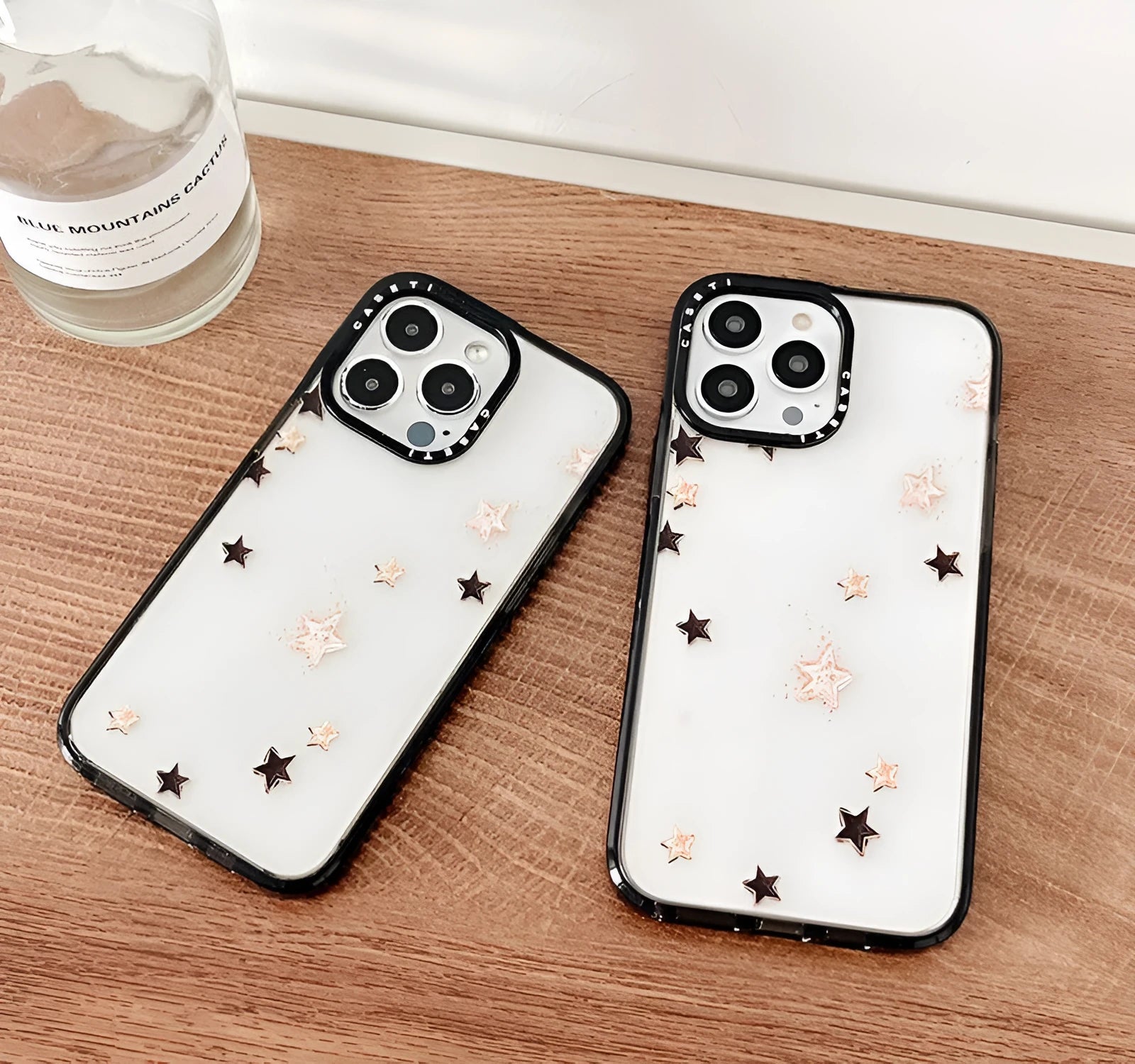 Hard PC phone case with engraved lucky star doodle design and acrylic side finish