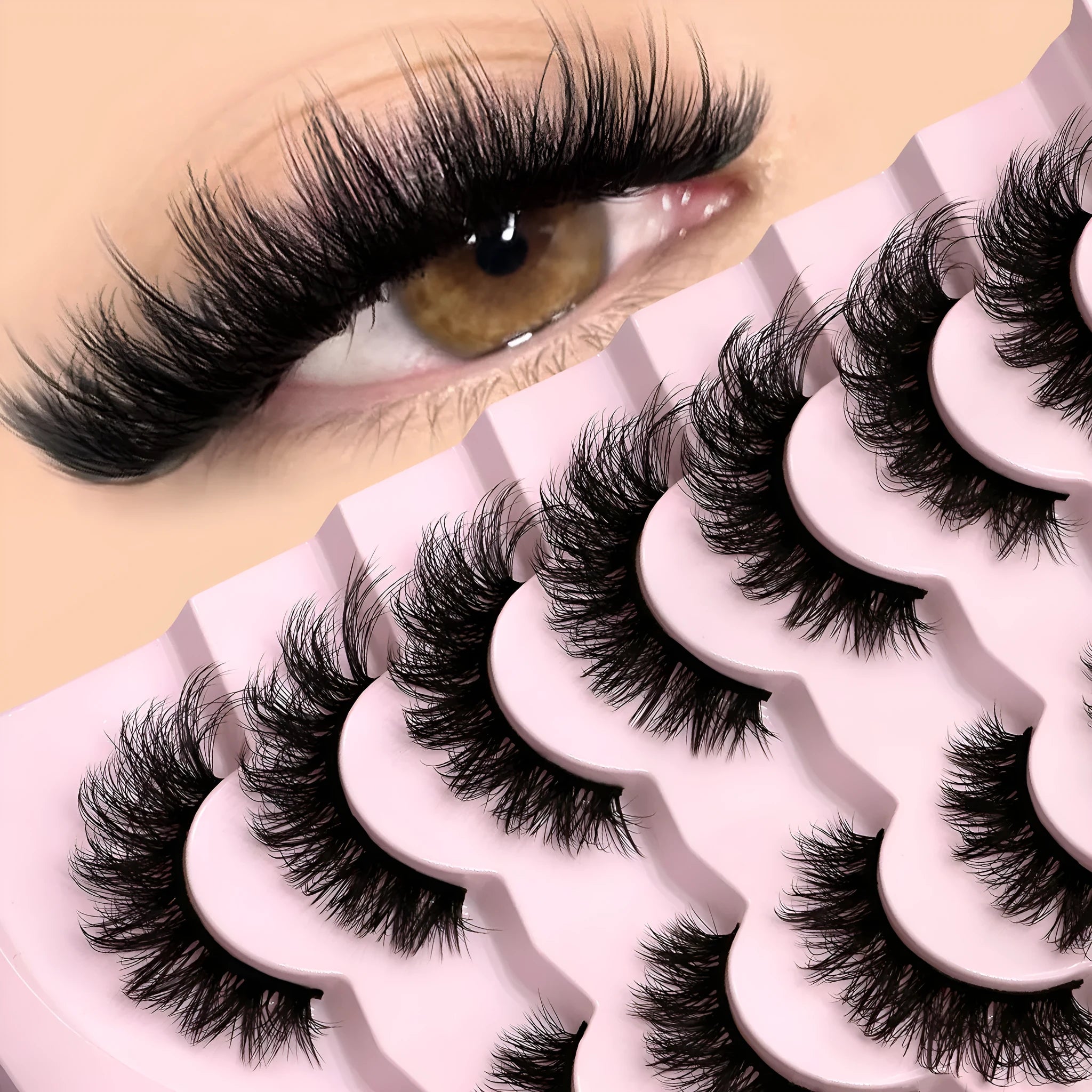 Box of natural long style false eyelashes with thick, dense artificial fibres and included glue.