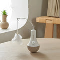 Intelligent tumbler electric cat toy made of ABS plastic with USB Type-C charging port, cat horn attachment, and LED light indicator