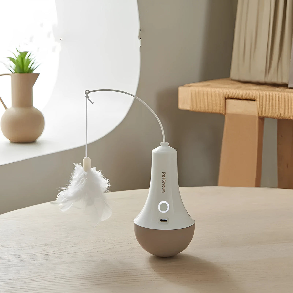 Intelligent tumbler electric cat toy made of ABS plastic with USB Type-C charging port, cat horn attachment, and LED light indicator