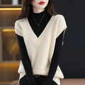 Women's creamy-white sleeveless cashmere-knit vest with a raised 3D pattern, shown as a pullover.