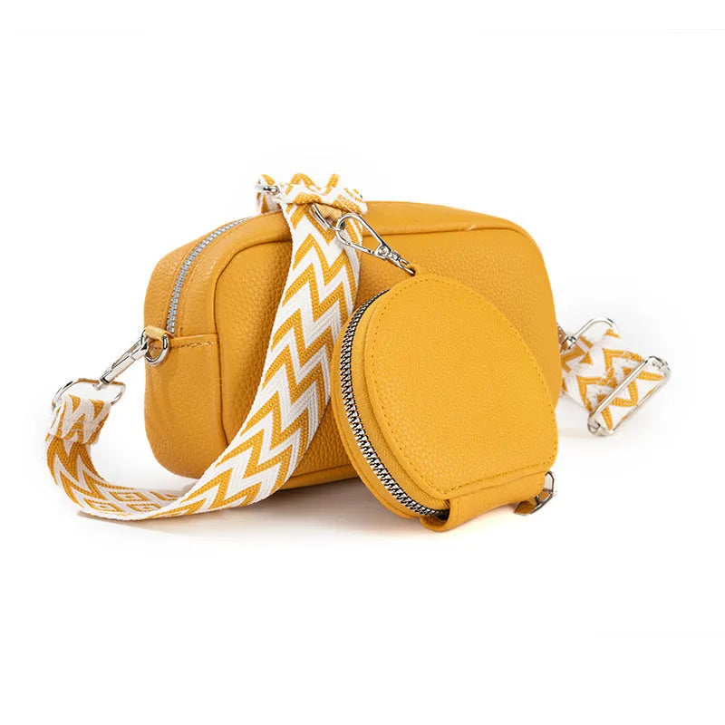 Women's soft PU crossbody bag in horizontal square shape showing internal zipper pocket and eight colour options