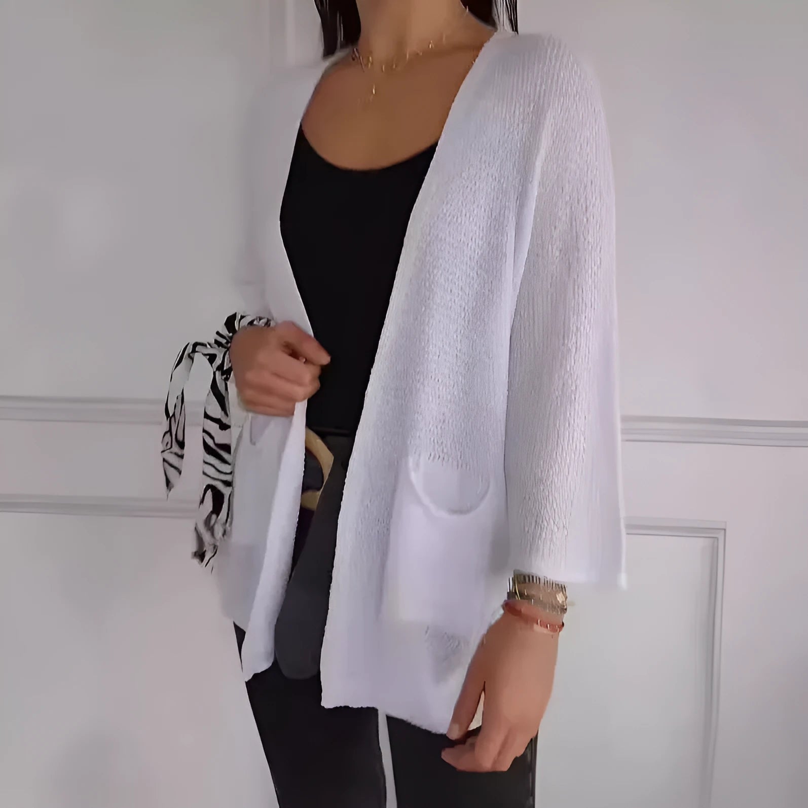 Women's waffle texture cardigan coat in army green with nine-quarter length sleeves and pockets.