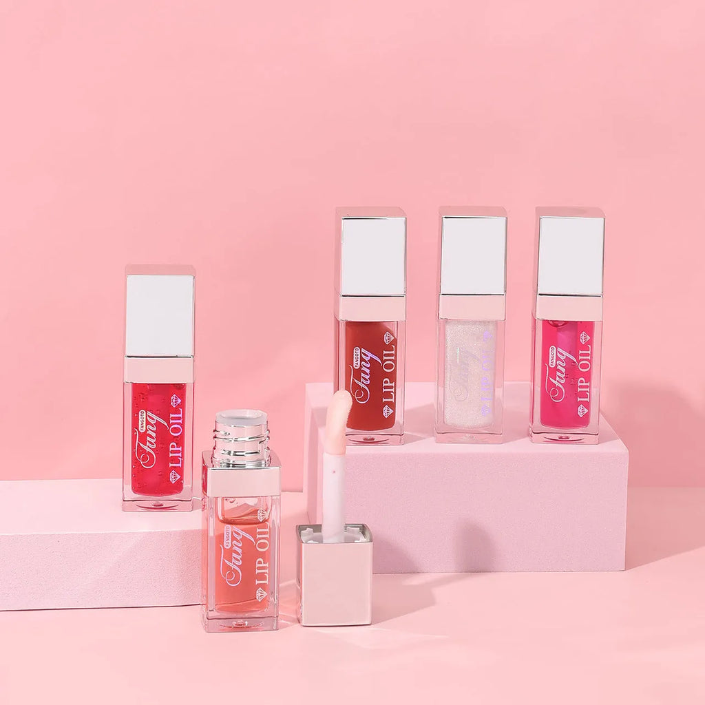 Five bright coloured mint lip gloss tubes showing shades Style001, Style006, Style007, Style012 and Style015