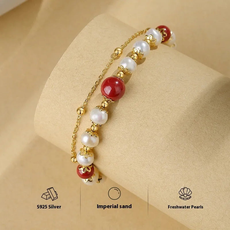 Sterling silver double-layer bracelet with freshwater pearls in white moonlight and cinnabar mole colours
