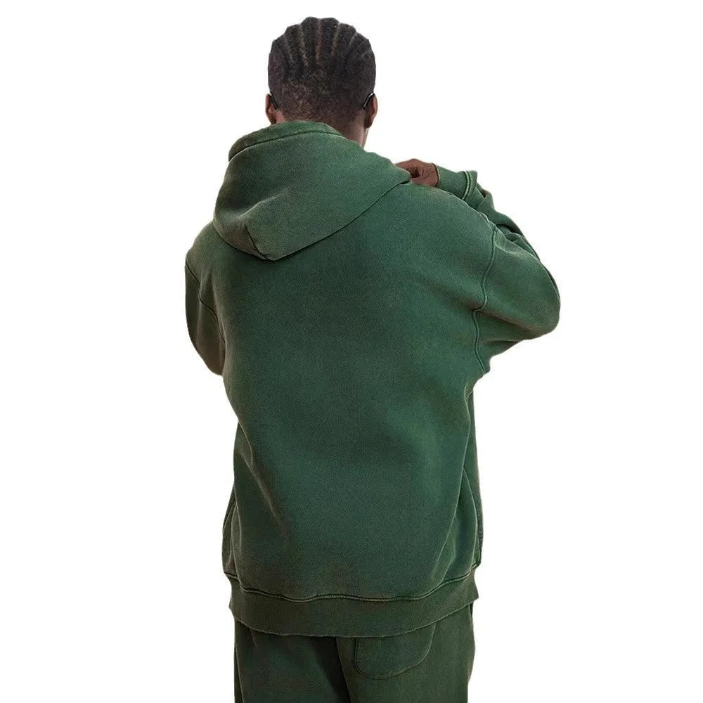 Men's dark green hooded cardigan sweater with a double zipper and fleece lining.