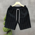 Men's black and white striped casual shorts with fleece lining and elastic waistband