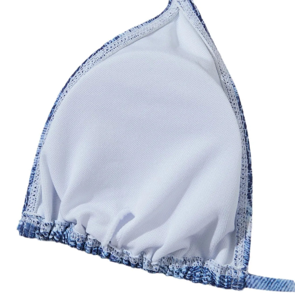Denim blue printed bikini set with criss-cross straps on the top.