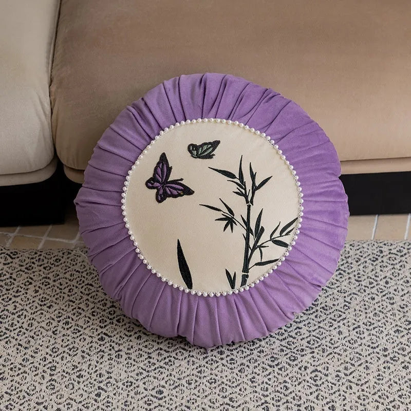 Square cushion with Chinese butterfly embroidery in beige, black, or purple colours.