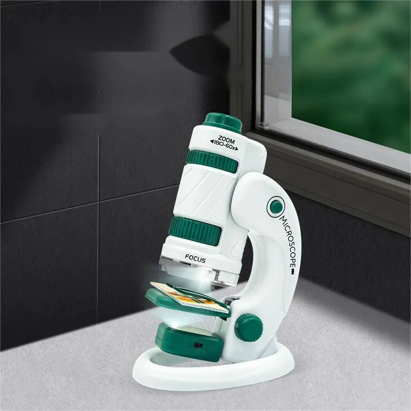 Portable microscope set with teaching aids and specimen slides for educational use in white-green colour