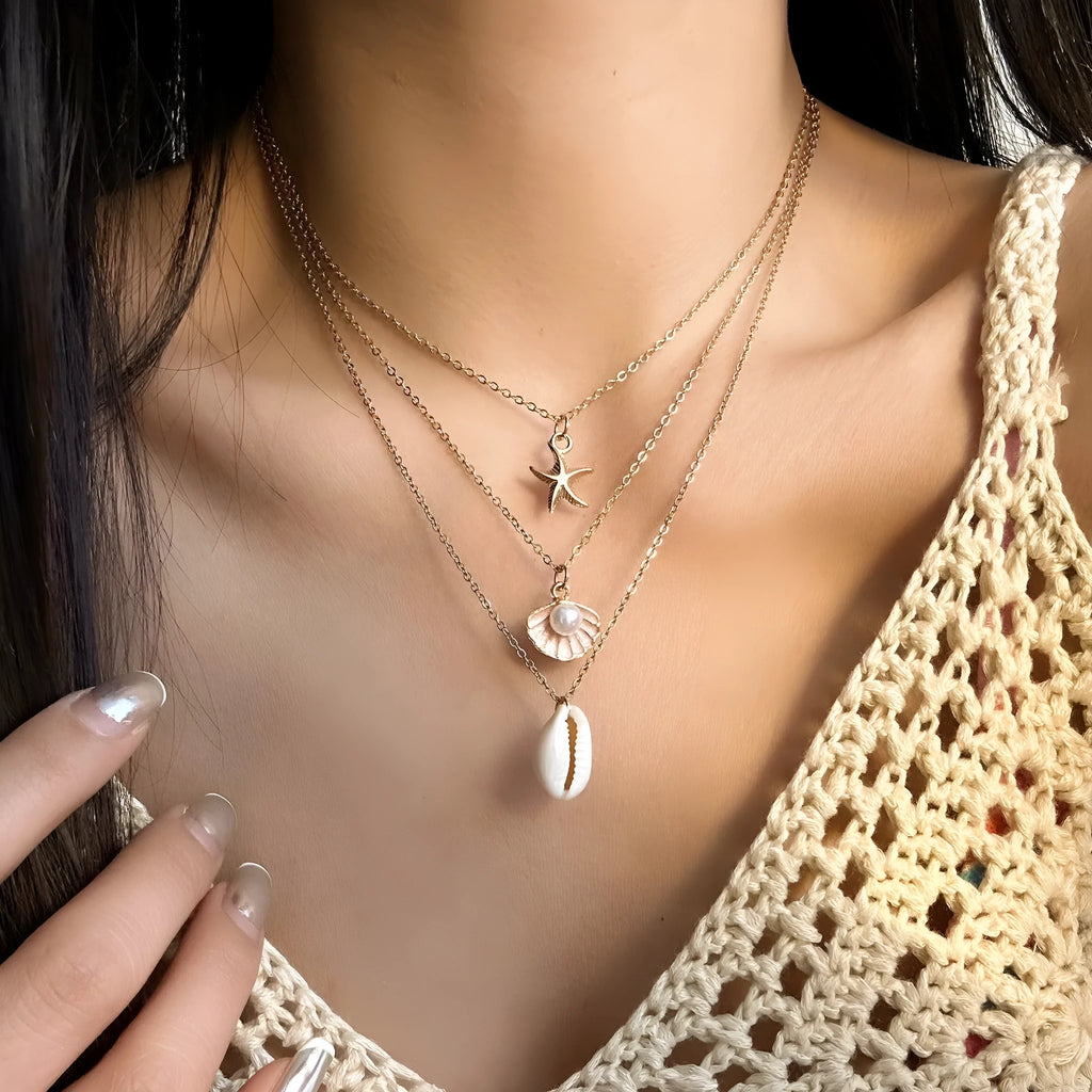 European American beach style starfish shell pendant necklace for women, pink shell colour, alloy and wooden bead construction