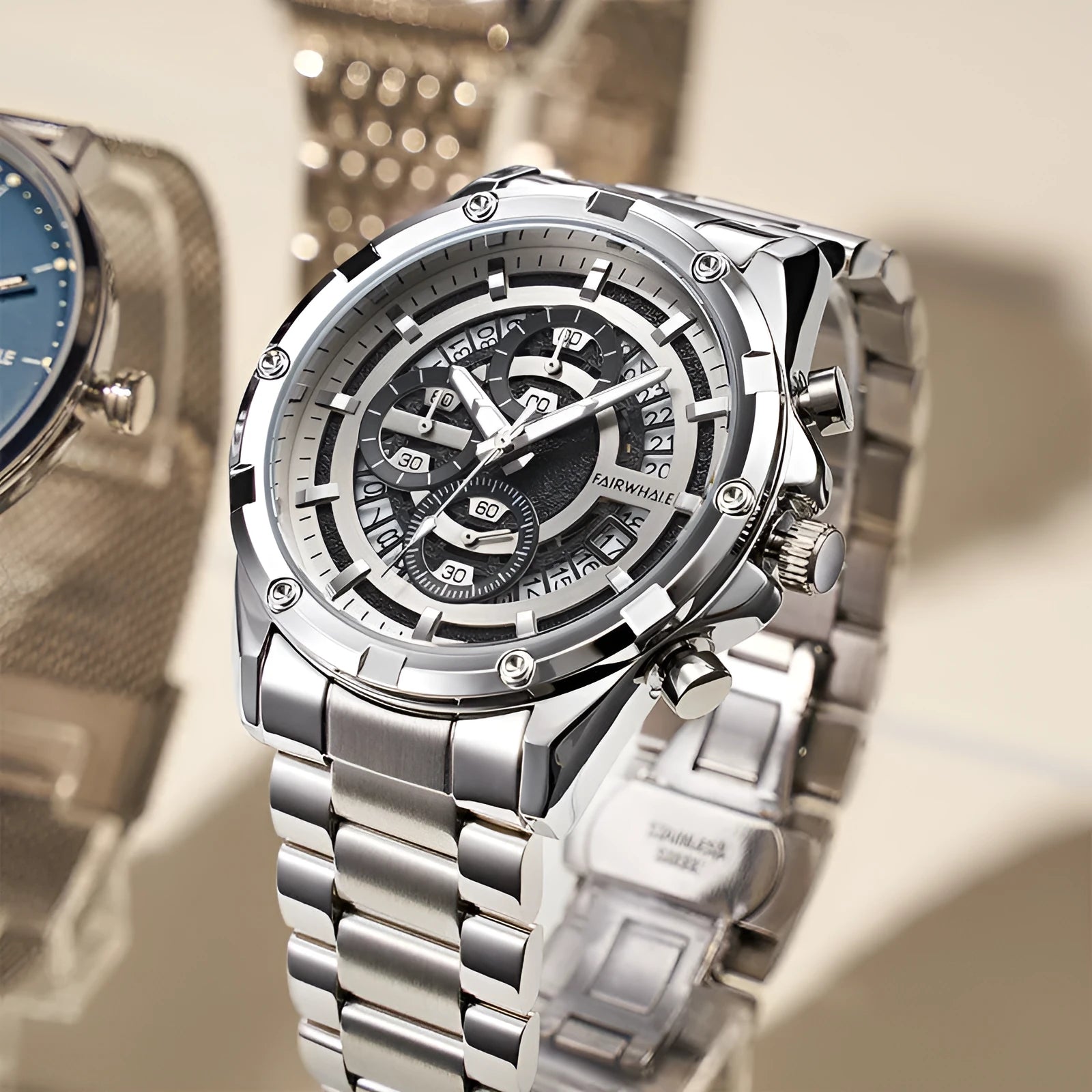 Men's waterproof luminous casual quartz watch with steel band in three colourway options.