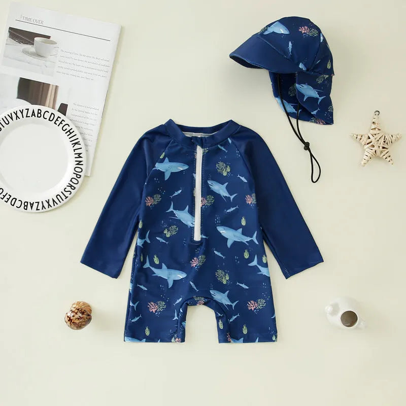Children’s polyester jumpsuit swimsuit with hat in dark blue shark design, size 100
