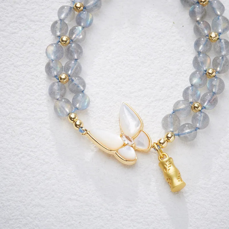 Grey moonstone geometric bracelet with butterfly woven hand rope for women.