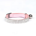 Rhinestone-decorated suede velvet cat collar shown in multiple colours on adjustable strap