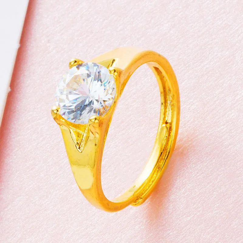 Women's adjustable copper ring with zircon stone in six colour options on a white background.