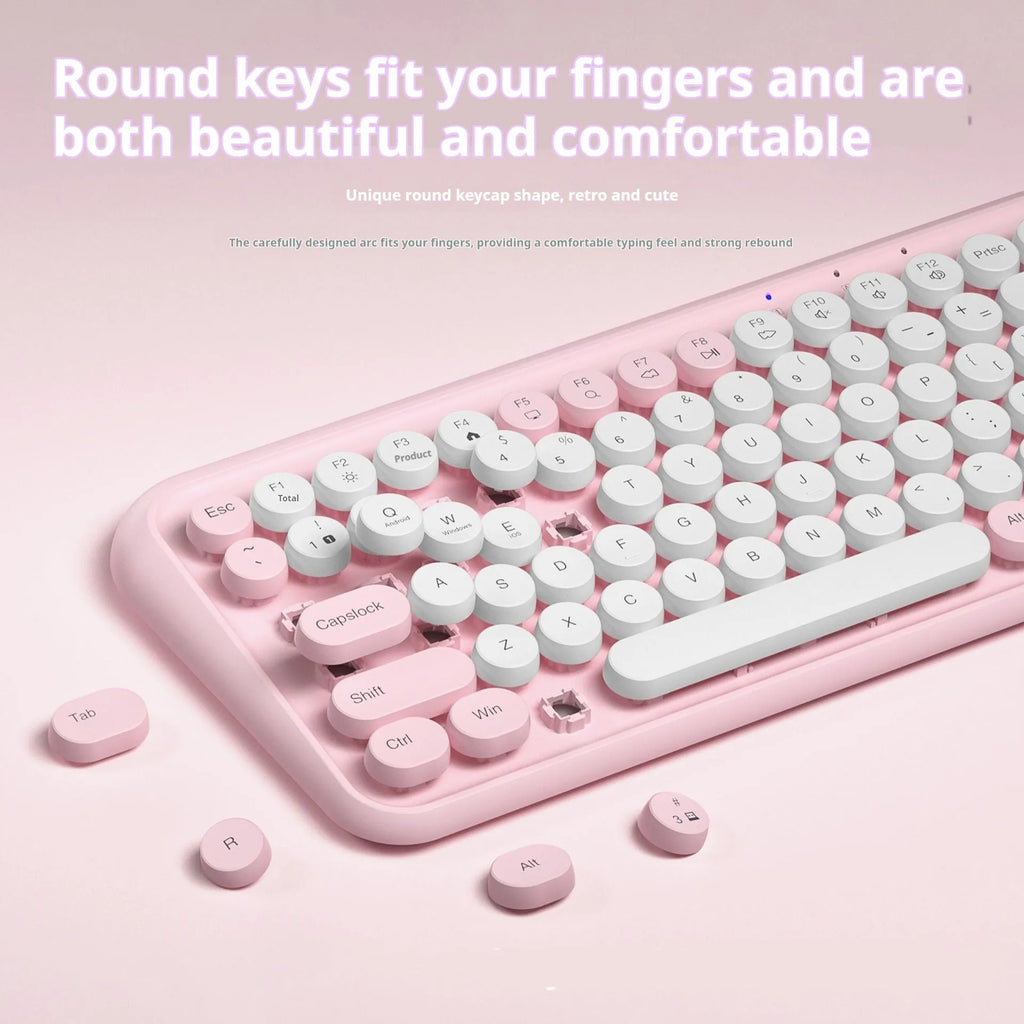 Pink Bluetooth wireless keyboard with 84 keys measuring 339mm wide
