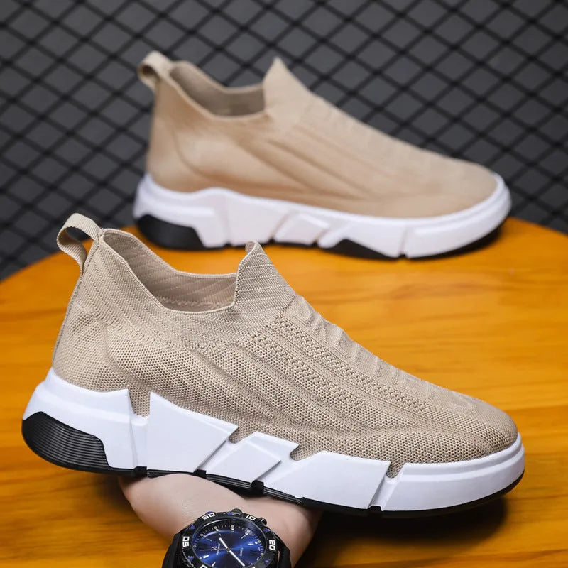 Men's slip-on casual sports shoes with black flyknit mesh upper and sock cuffs, flat PVC sole