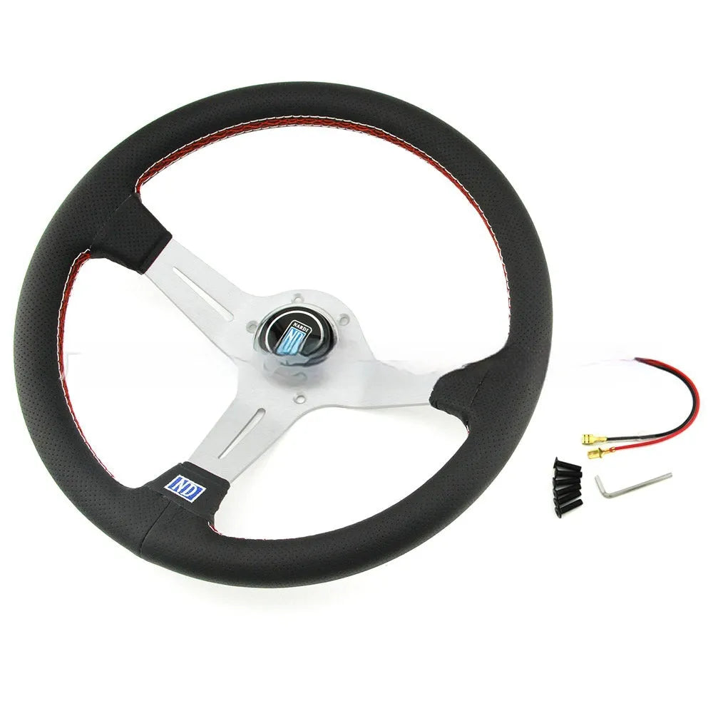 14-inch leather steering wheel with a concave centre and perforated grip, showing black skeleton option.