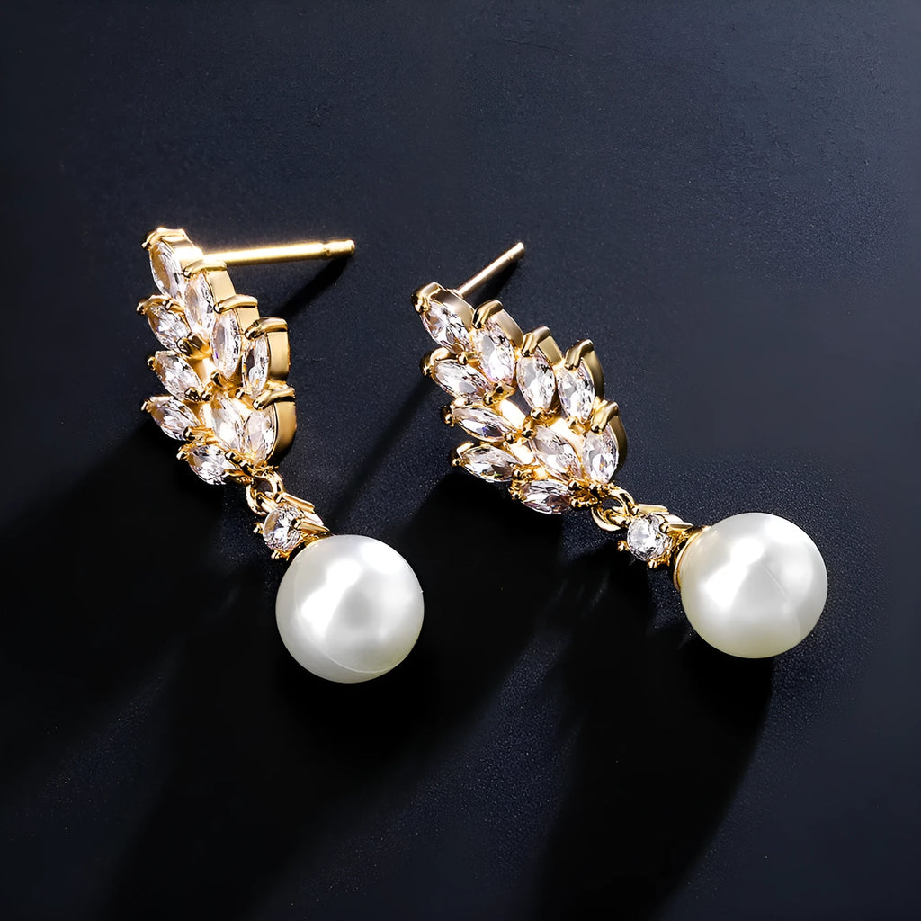 Geometric flower earrings with micro inlaid zircon stones and pearl elements in three plating colours
