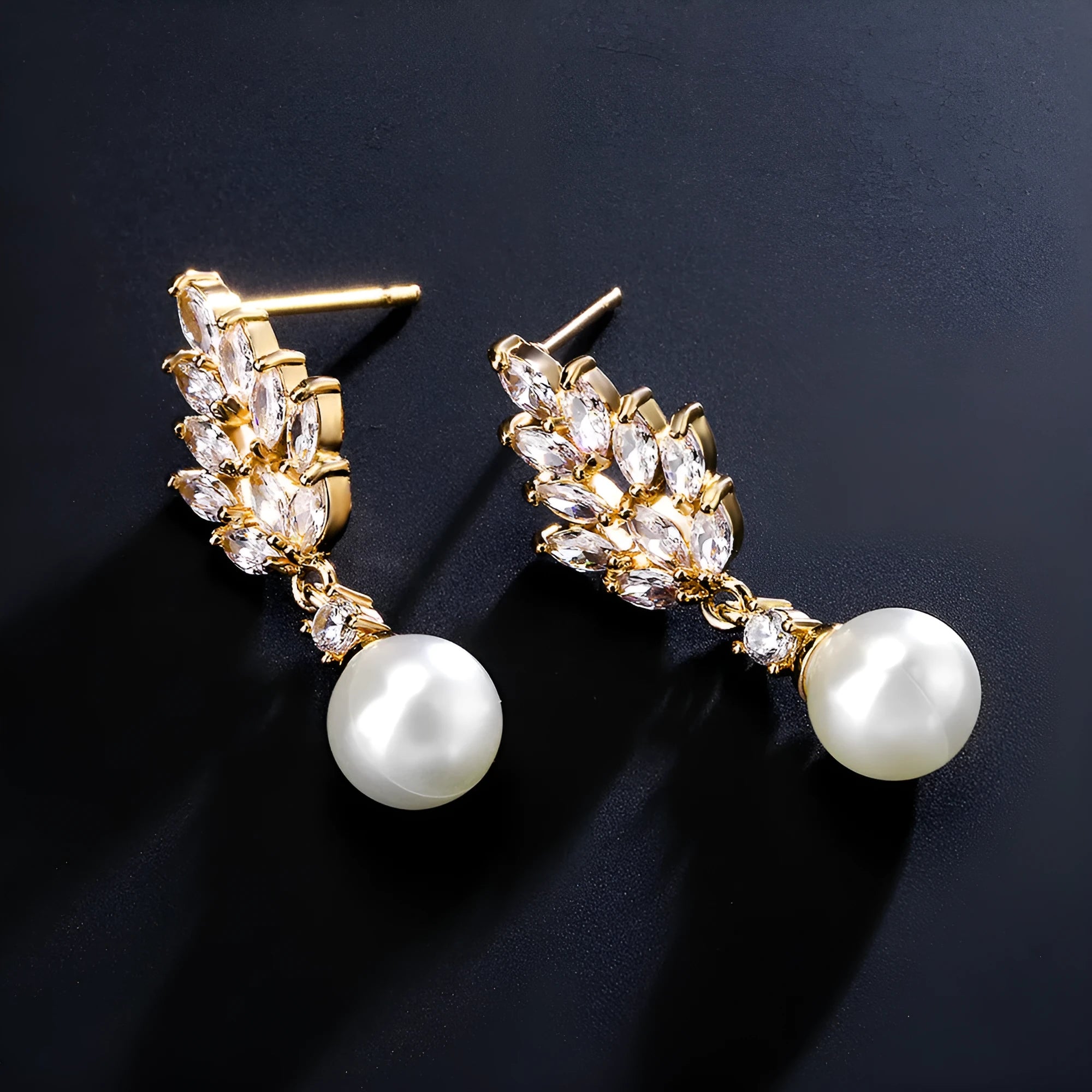 Geometric flower earrings with micro inlaid zircon stones and pearl elements in three plating colours