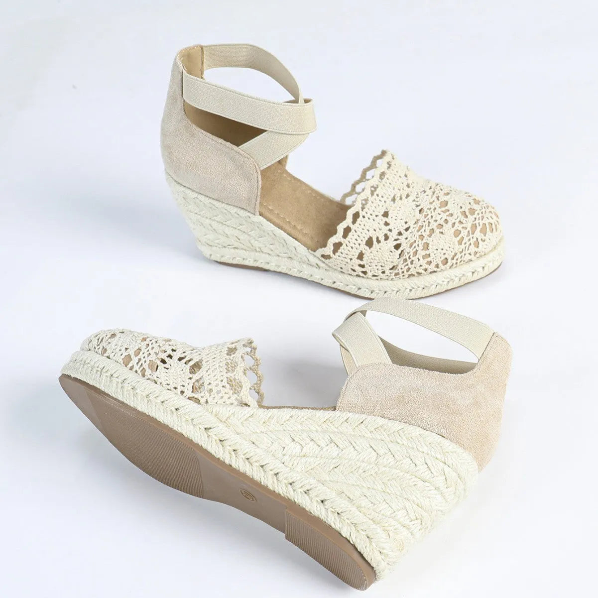 Women's apricot and black canvas wedge sandals with Roman style round toe.