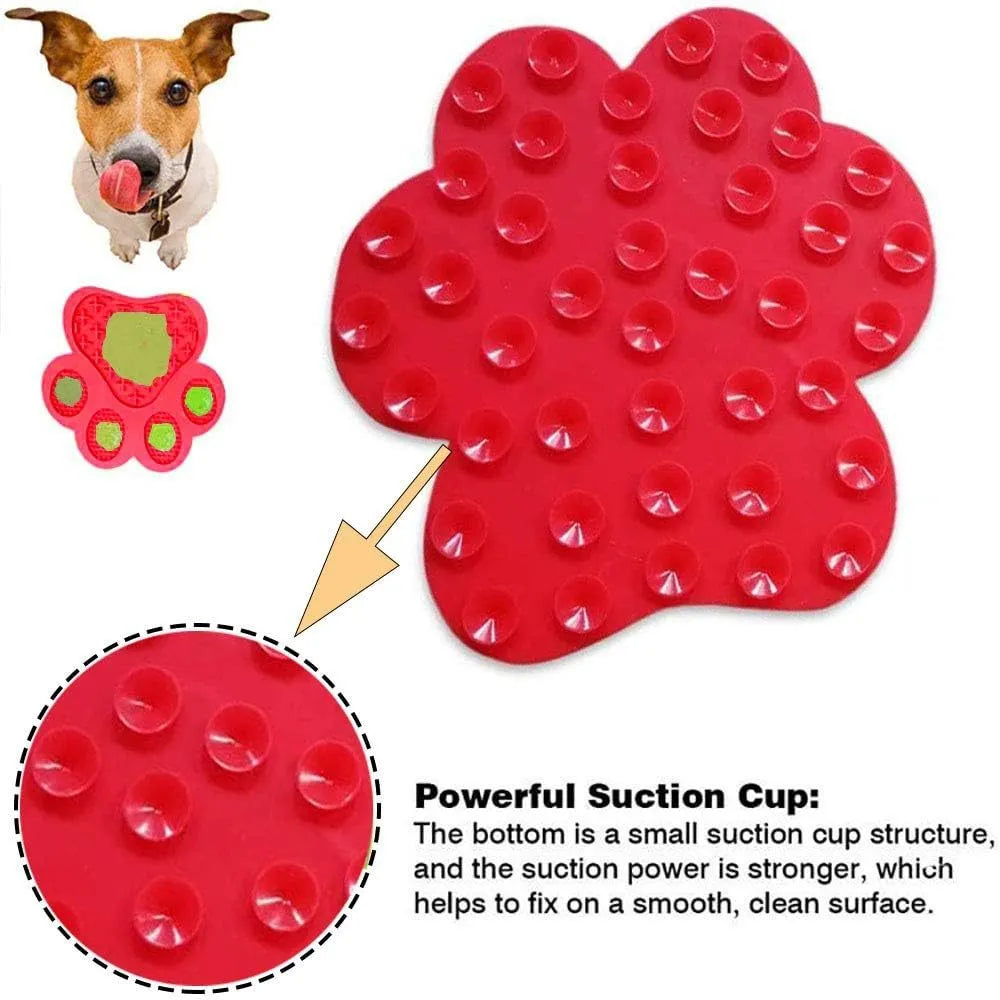 Blue silicone dog licking mat with bone texture and suction cups on the back for sticking to smooth surfaces.