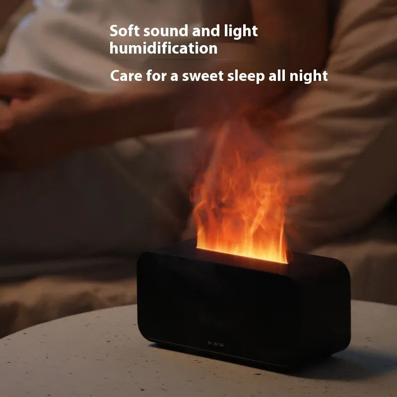 Black and white USB aromatherapy diffuser with simulated flame effect showing mist output.