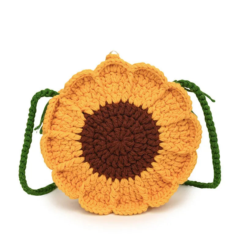 Round hand-woven wool bag with crocheted flowers, cotton lining, and mobile phone pocket