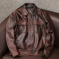 Men's plus size black retro lapel short leather jacket with side pockets on a model.