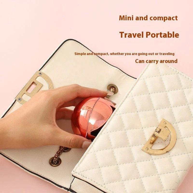 Reusable Pet Hair Remover Ball in Liquid Silver and Rose Gold colors, featuring hydro-slips technology and diatom mud for effective cleaning of clothes, furniture, and surfaces.