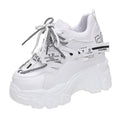 Women's white mesh platform shoes with cross strap and 6-8cm rubber sole heel.