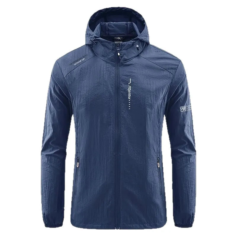 Man wearing a lightweight grey hooded nylon jacket for summer sun protection