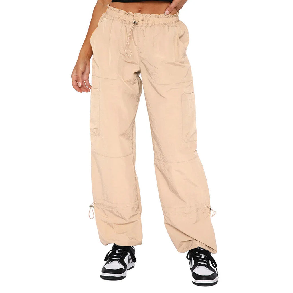 Men's loose-fit straight-leg cargo casual trousers in black with multiple utility pockets on the legs.