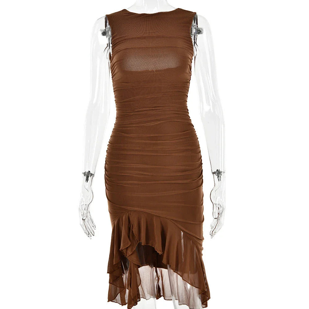 Chic sleeveless mini dress with collage design in various colors for stylish summer parties and events