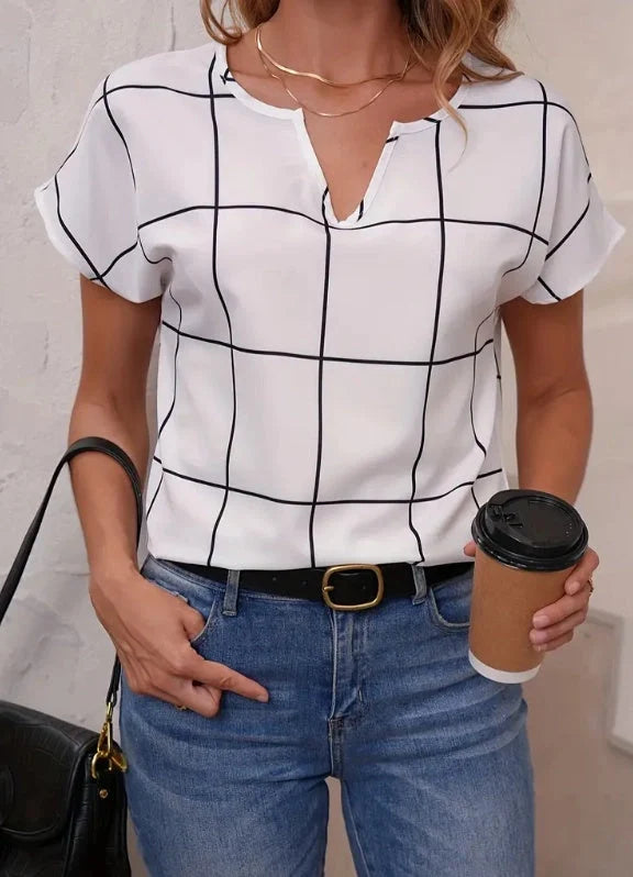 Women's plaid print notched neck short sleeve blouse in yellow, white, and blue