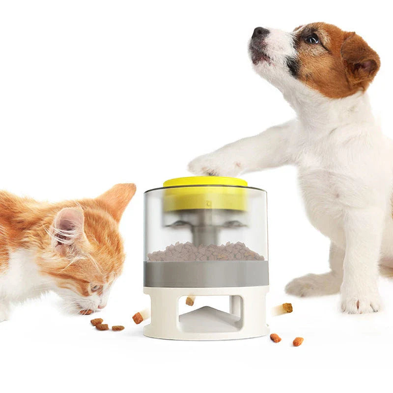 Interactive dog food feeder with anti-slip base in white and yellow