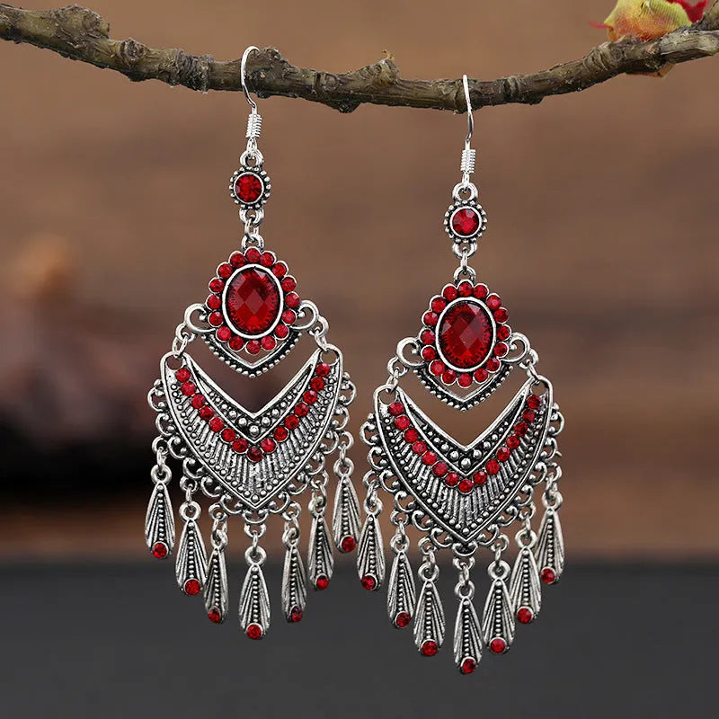 Purple water drop shaped retro earrings with long fringe detailing and ethnic style elements
