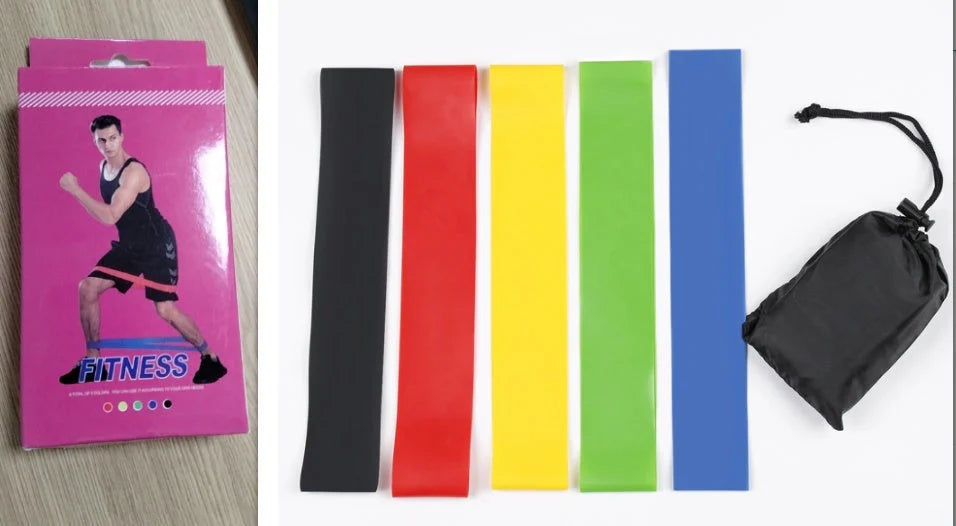 Set of five colour-coded resistance bands for yoga and fitness training, with storage bag