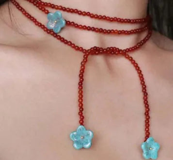 Red agate beaded necklace with acrylic geometric pendant and regular chain
